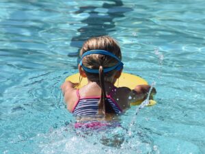 young swimmer, child, kick board-2494904.jpg